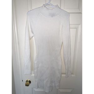 This is a white Bardot sweater dress, in a size medium!